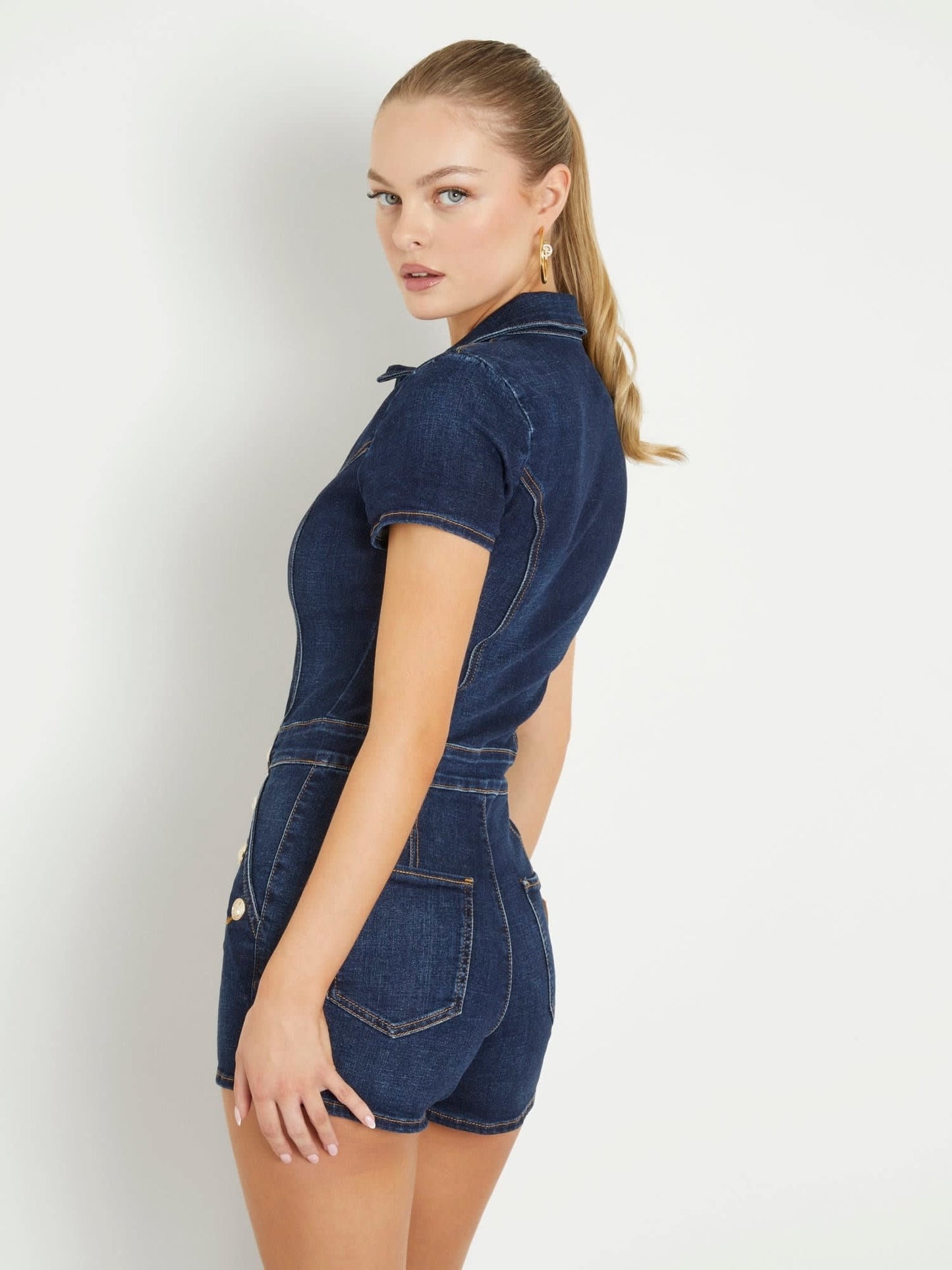 Exposed buttons denim jumpsuit